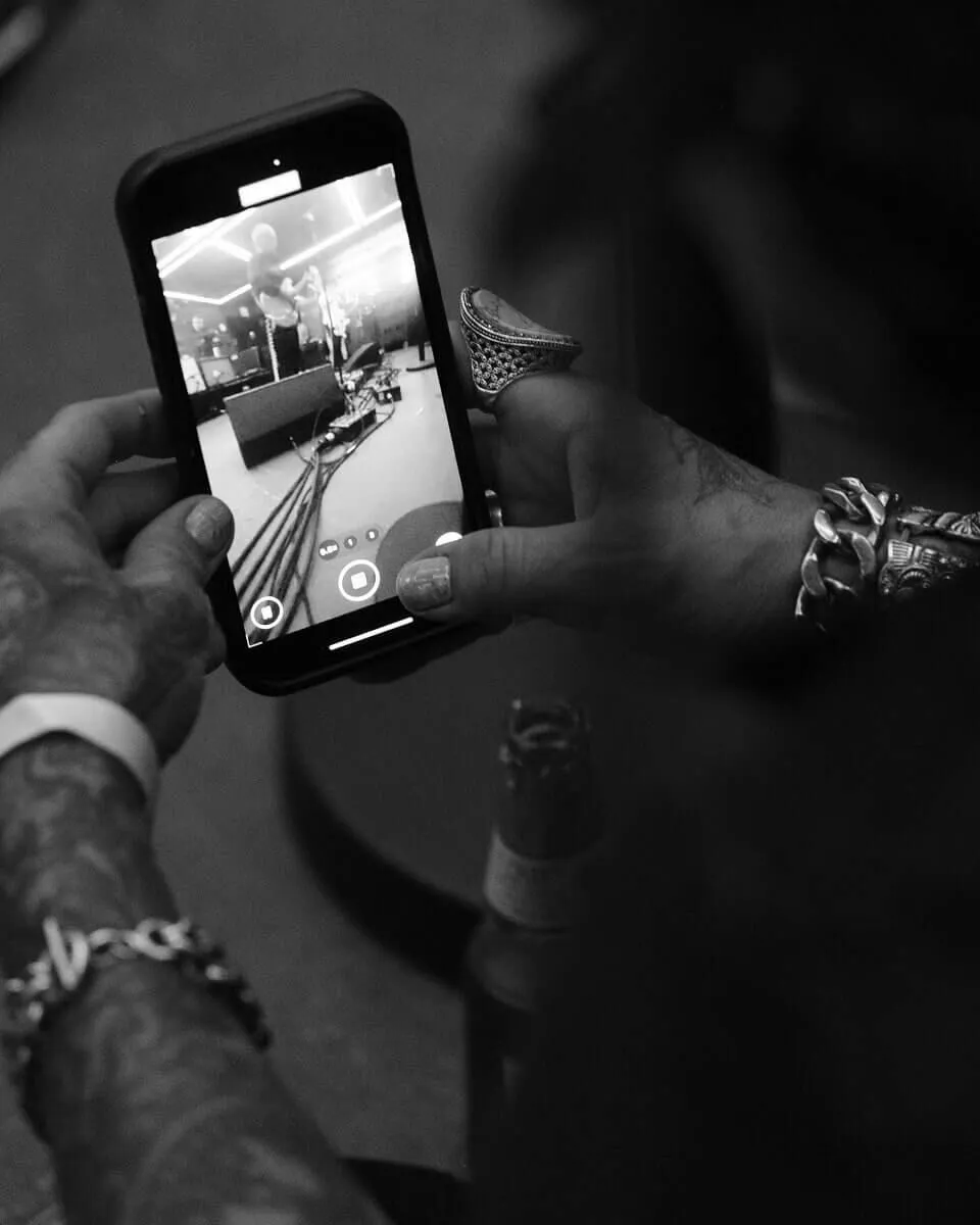 Black and white image of an iPhone taking a video