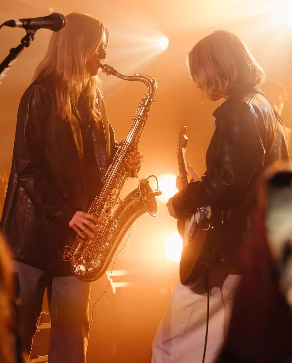 Singer singing on stage.