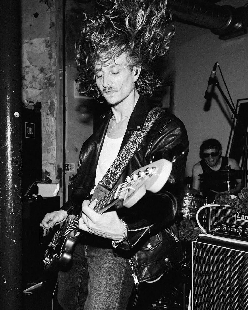 Black and white photograph of LEAP bassist