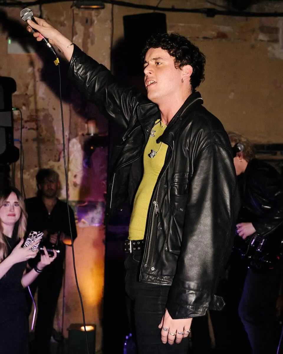 LEAP singer inviting the audience to sing