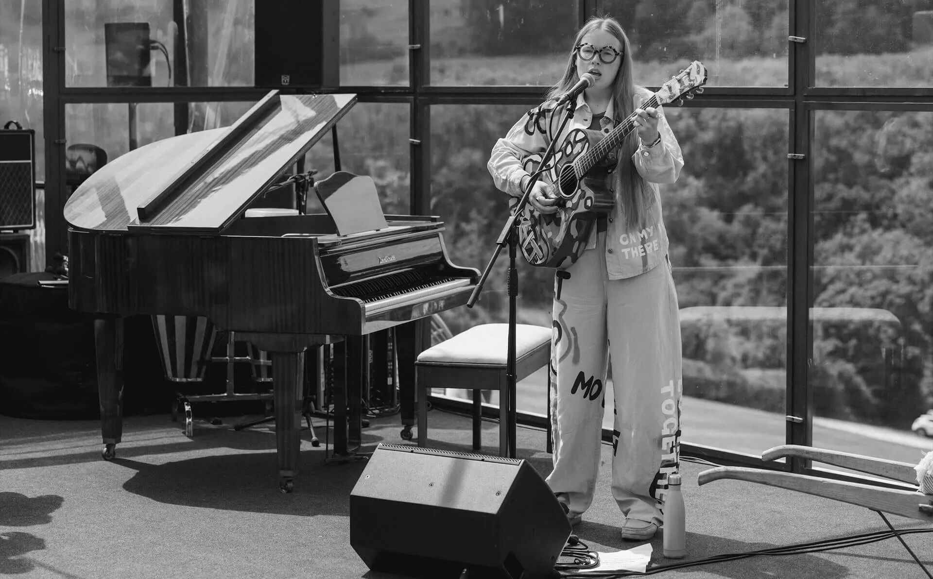 Singer singing on stage.