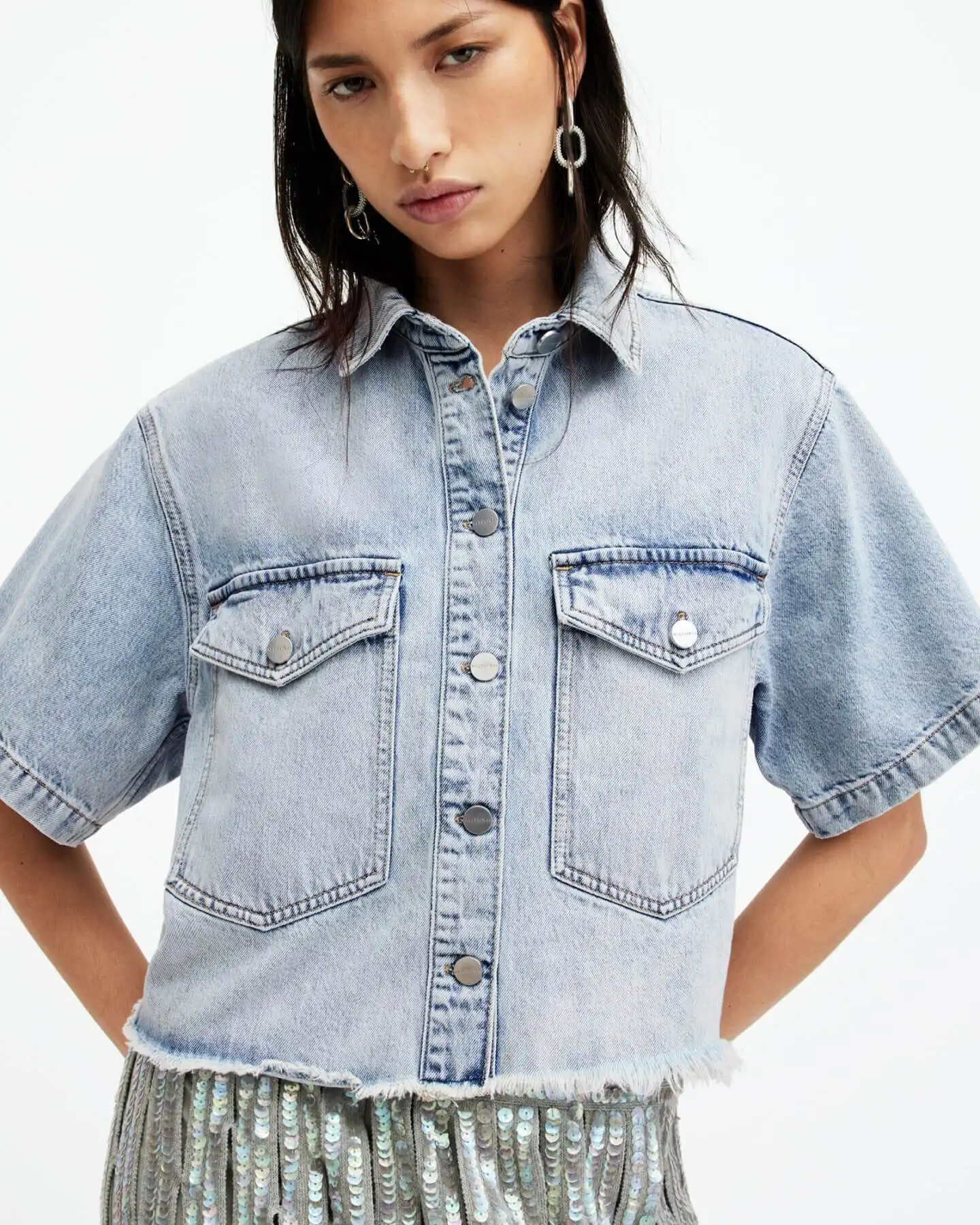 Shop the Tove Cropped Oversized Denim Shirt.