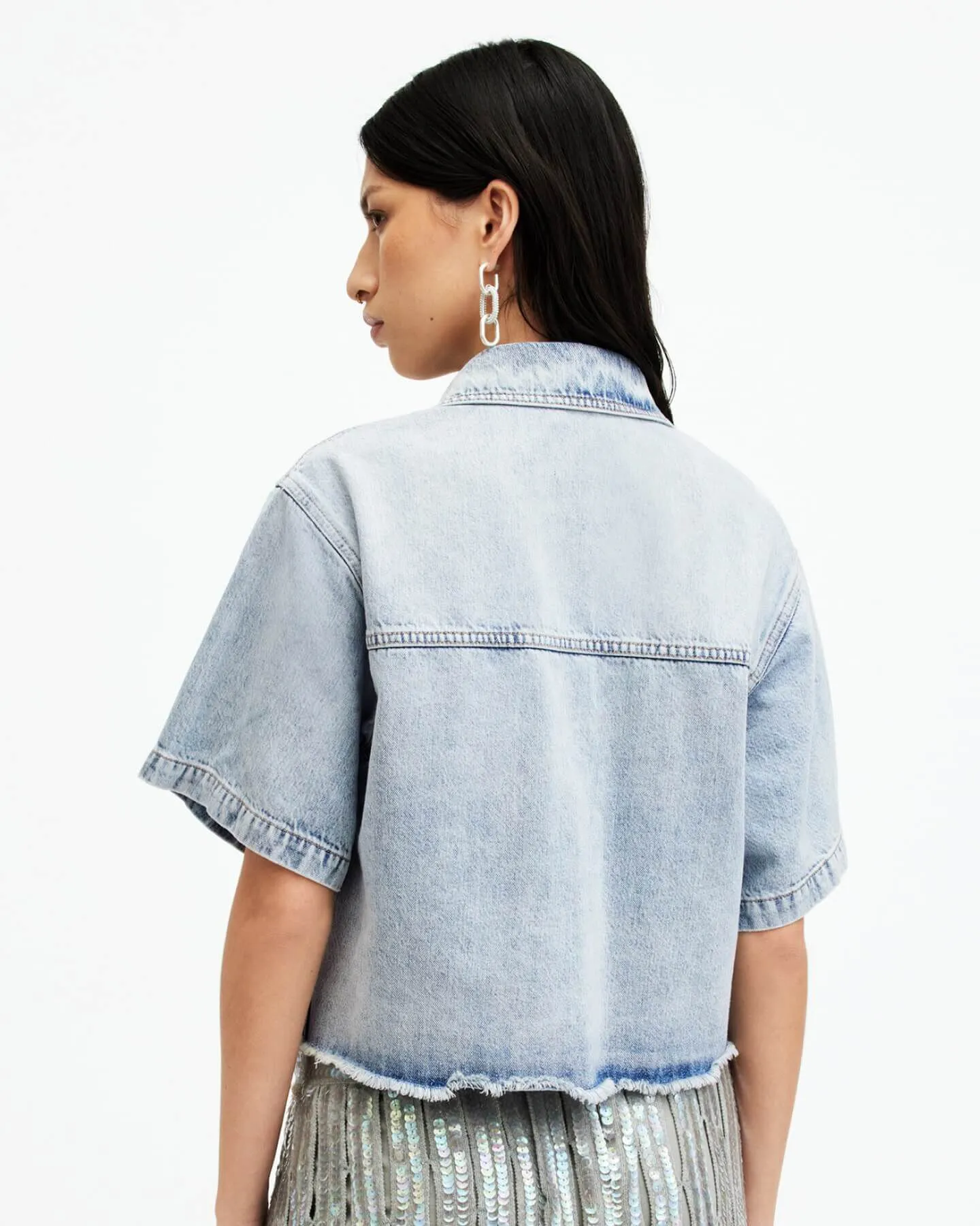 Shop the Tove Cropped Oversized Denim Shirt.